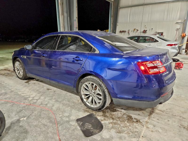 Photo 2 from auction – 2014 FORD TAURUS LIM with VIN 1FAHP2F86EG103581