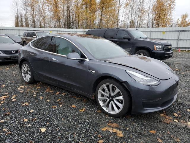Photo 4 from auction – 2018 TESLA MODEL 3 with VIN 5YJ3E1EB2JF188375