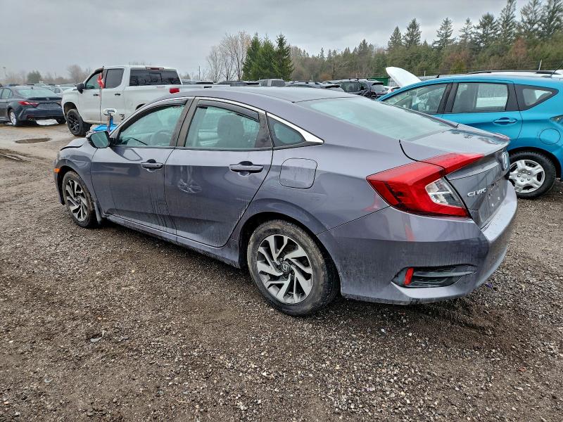 Photo 2 from auction – 2017 HONDA CIVIC LX with VIN 2HGFC2F58HH036107