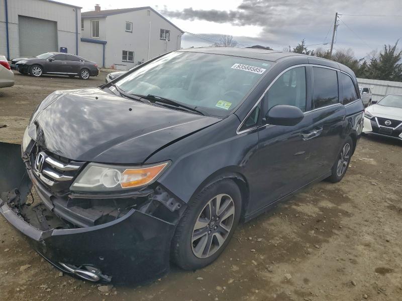 HONDA ODDESEY 2014 with VIN 5FNRL5H90EB094582 - Photo from auction