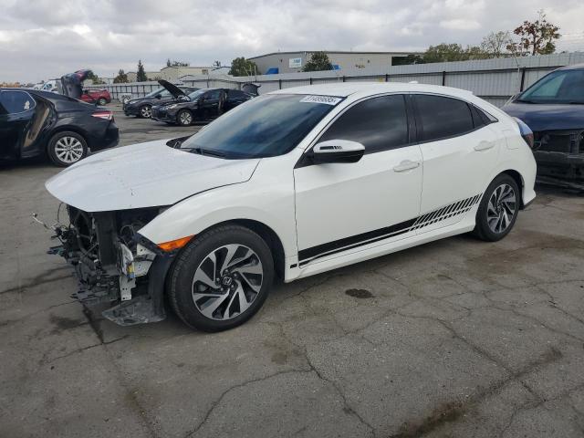 HONDA CIVIC LX 2018 with VIN SHHFK7H28JU415751 - Photo from auction