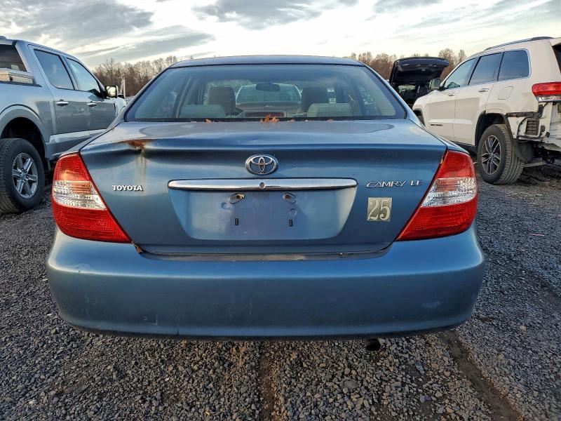 Photo 6 from auction – 2003 TOYOTA CAMRY LE with VIN 4T1BE32K83U722397