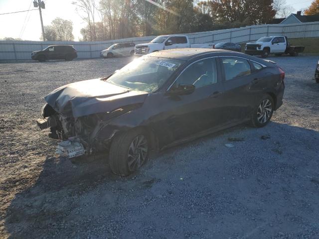 HONDA CIVIC EX 2017 with VIN 19XFC2F7XHE036296 - Photo from auction