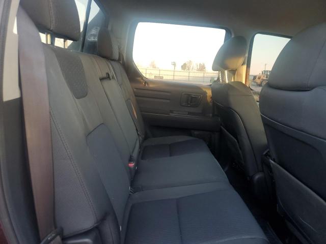 Photo 10 from auction – 2009 HONDA RIDGELINE with VIN 5FPYK164X9B102229