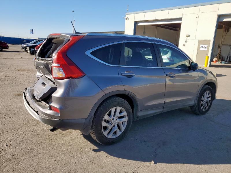 Photo 3 from auction – 2015 HONDA CR-V EXL with VIN 2HKRM4H70FH643352