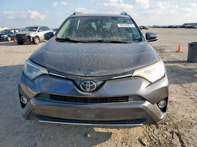 Photo 5 from auction – 2017 TOYOTA RAV4 XLE with VIN JTMWFREV2HJ132393