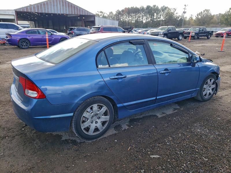 Photo 3 from auction – 2011 HONDA CIVIC LX with VIN 19XFA1F50BE032862