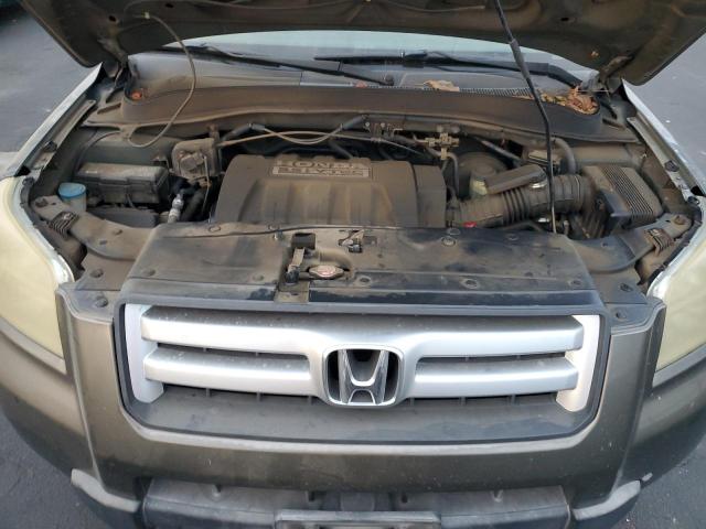 Photo 12 from auction – 2006 HONDA PILOT LX with VIN 5FNYF28116B048899