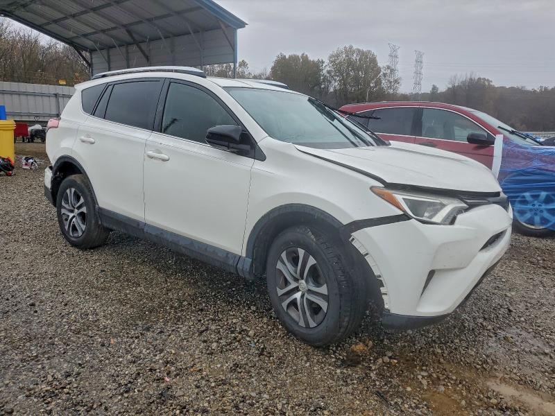 Photo 4 from auction – 2016 TOYOTA RAV4 LE with VIN JTMZFREV9GJ082376