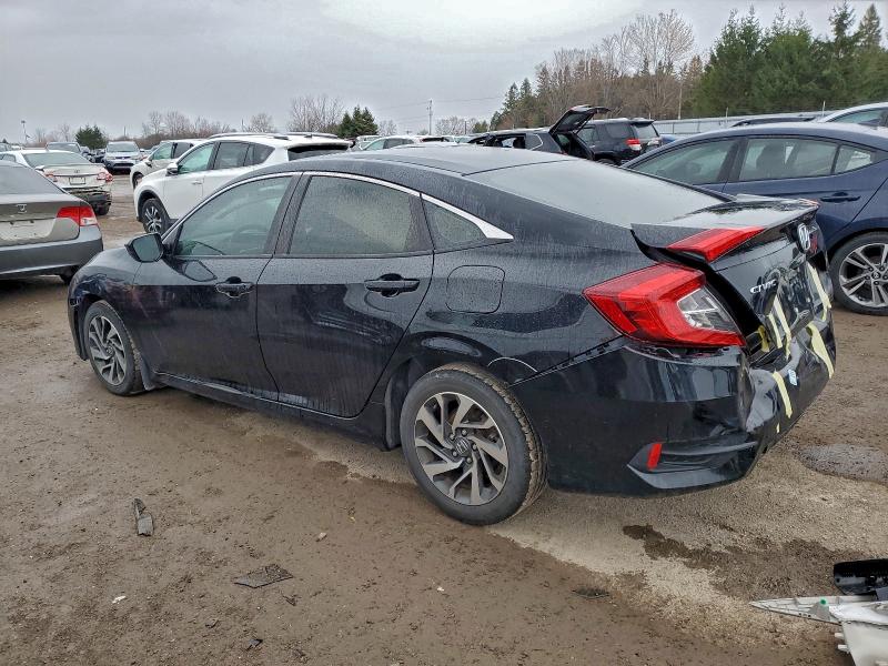 Photo 2 from auction – 2016 HONDA CIVIC EX with VIN 2HGFC2F70GH037560