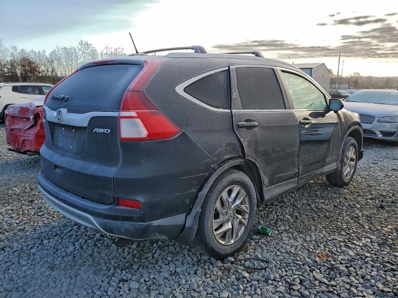 Photo 3 from auction – 2015 HONDA CR-V with VIN 2HKRM4H72FH675753
