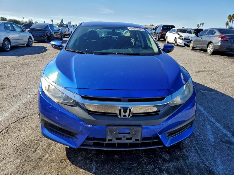 Photo 5 from auction – 2017 HONDA CIVIC LX with VIN 2HGFC2F51HH535072