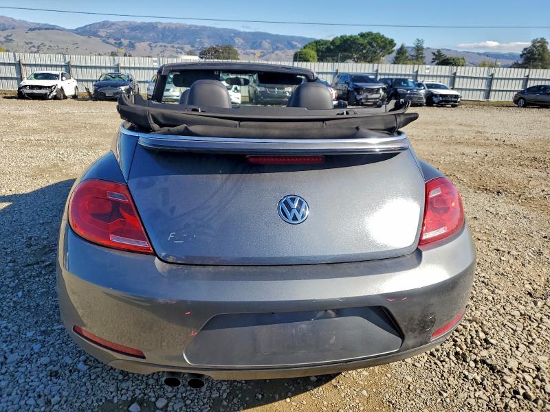Photo 6 from auction – 2013 VOLKSWAGEN BEETLE with VIN 3VW5P7ATXDM833579