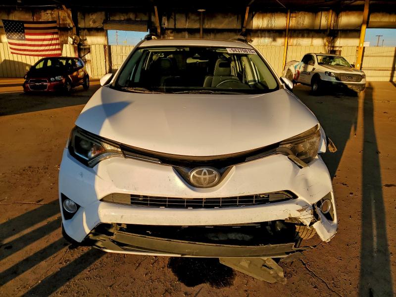 Photo 5 from auction – 2017 TOYOTA RAV4 XLE with VIN 2T3WFREV9HW403886