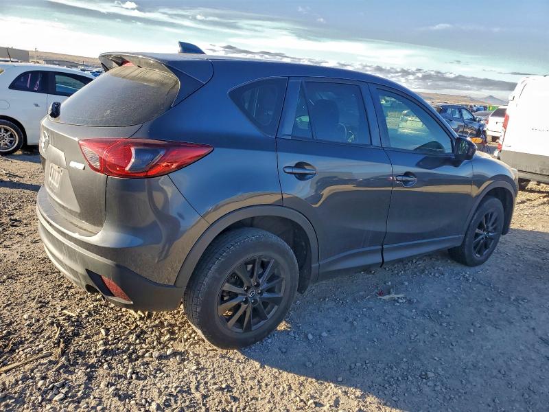 Photo 3 from auction – 2014 MAZDA CX-5 SPORT with VIN JM3KE4BE4E0405058