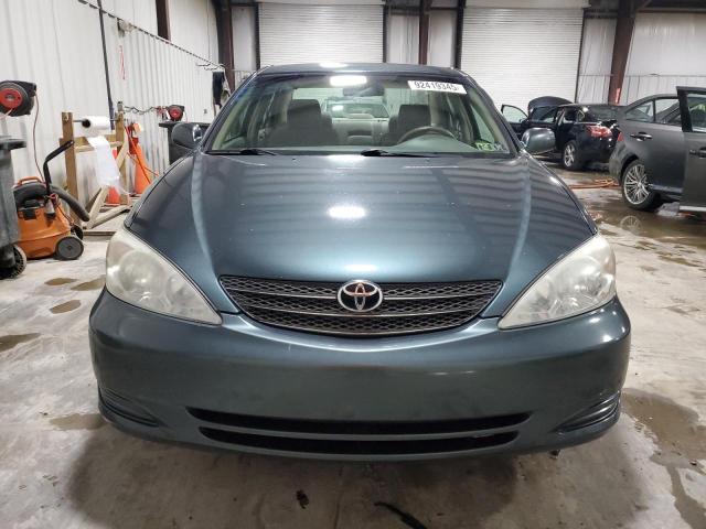 Photo 5 from auction – 2003 TOYOTA CAMRY LE with VIN 4T1BE30K93U719933