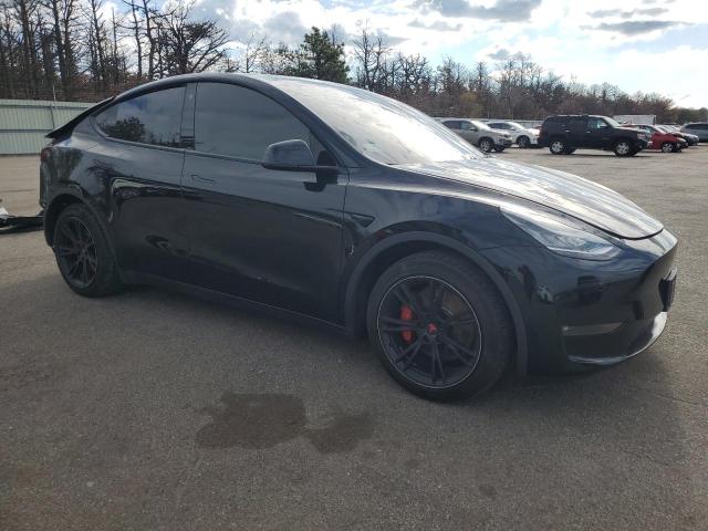 Photo 4 from auction – 2021 TESLA MODEL Y with VIN 5YJYGDEE2MF141766