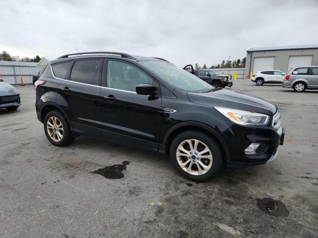 Photo 4 from auction – 2017 FORD ESCAPE SE with VIN 1FMCU9GD2HUD01917