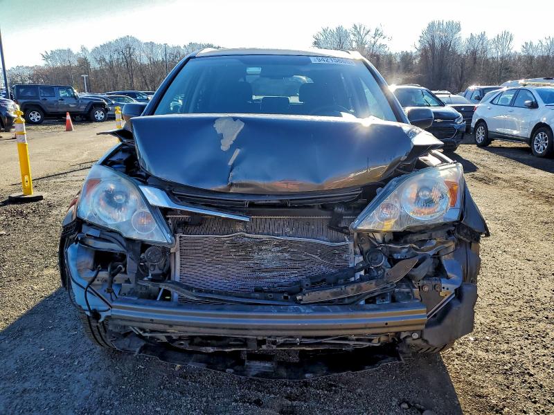 Photo 5 from auction – 2011 HONDA CR-V EX with VIN 5J6RE4H56BL034083