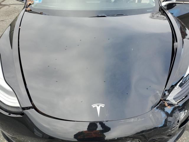 Photo 11 from auction – 2018 TESLA MODEL 3 with VIN 5YJ3E1EA8JF026421