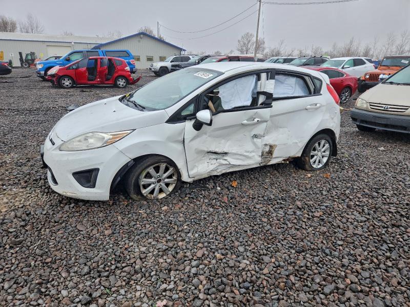 FORD FIESTA SE 2011 with VIN 3FADP4EJ8BM197009 - Photo from auction