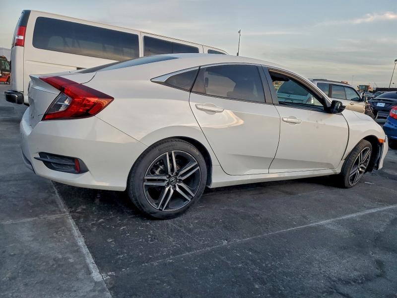 Photo 3 from auction – 2019 HONDA CIVIC LX with VIN 2HGFC2F61KH575765