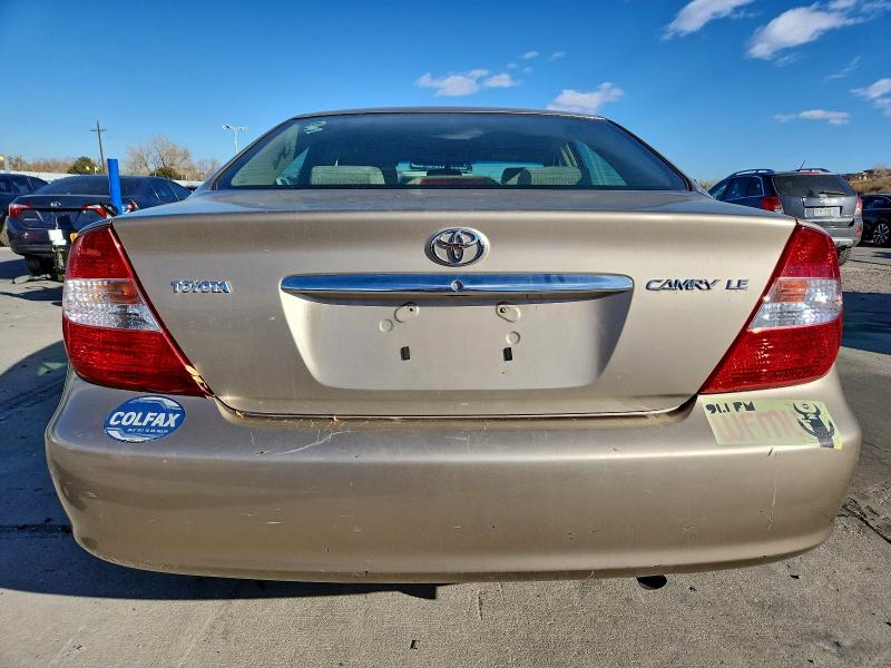 Photo 6 from auction – 2002 TOYOTA CAMRY LE with VIN JTDBE32K320042465