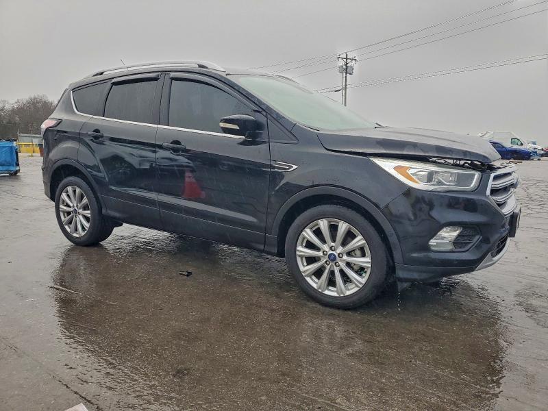 Photo 4 from auction – 2017 FORD ESCAPE TIT with VIN 1FMCU0JD6HUC92837