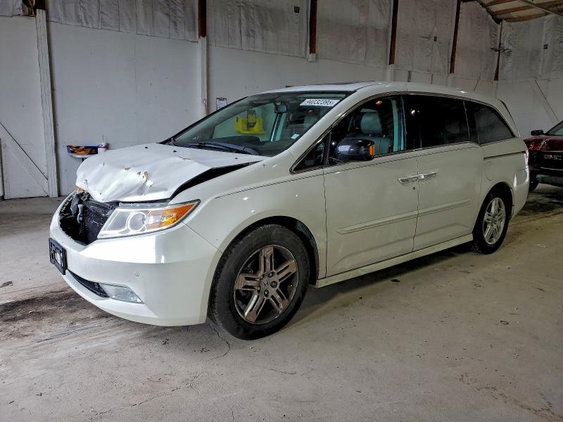 HONDA ODYSSEY TO 2012 with VIN 5FNRL5H90CB087211 - Photo from auction