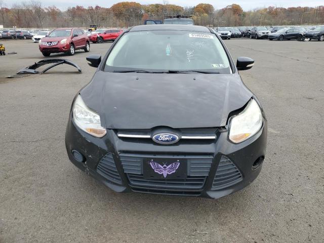 Foto 5 de la subasta – 2014 FORD FOCUS SE con VIN 1FADP3K27EL446509