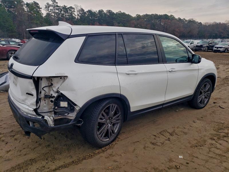 Photo 3 from auction – 2021 HONDA PASSPORT E with VIN 5FNYF8H59MB001820