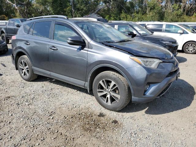 Photo 4 from auction – 2017 TOYOTA RAV4 XLE with VIN JTMRFREV0HD217759