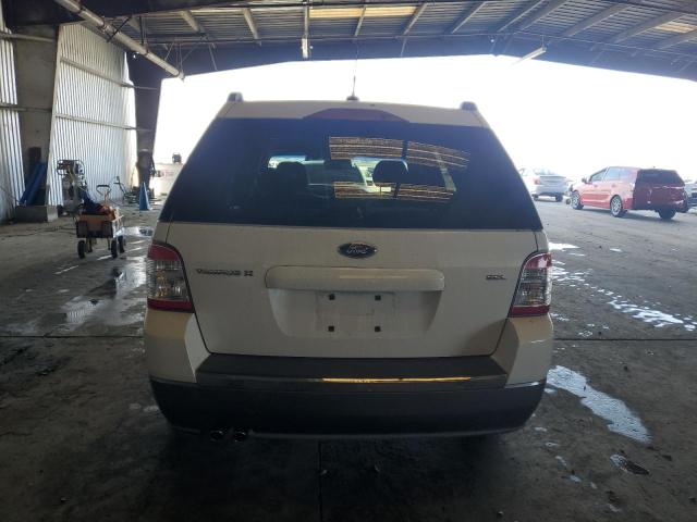 Photo 6 from auction – 2008 FORD TAURUS X S with VIN 1FMDK02W68GA24475