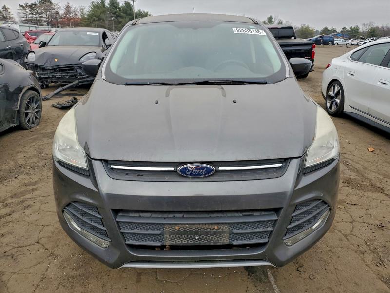 Photo 5 from auction – 2015 FORD ESCAPE SE with VIN 1FMCU9GX0FUB67500