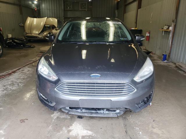 Photo 5 from auction – 2015 FORD FOCUS TITA with VIN 1FADP3N20FL381595