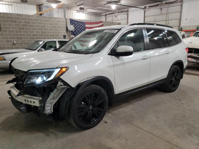 HONDA PILOT SE 2022 with VIN 5FNYF6H28NB053077 - Photo from auction