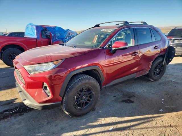 TOYOTA RAV4 XLE 2019 with VIN JTMP1RFV1KJ017972 - Photo from auction