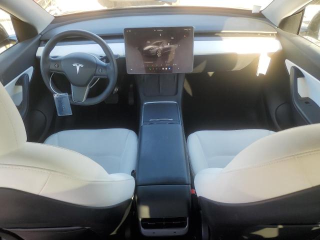 Photo 8 from auction – 2022 TESLA MODEL Y with VIN 7SAYGDEE2NF393554