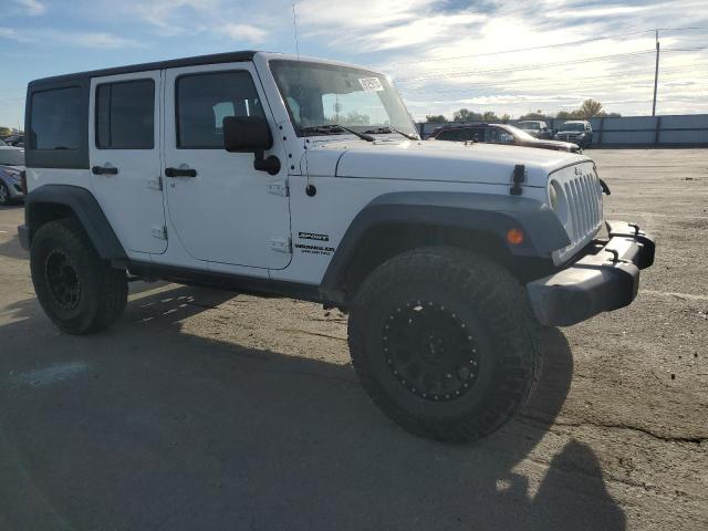 Photo 4 from auction – 2015 JEEP WRANGLER U with VIN 1C4BJWDG4FL570025