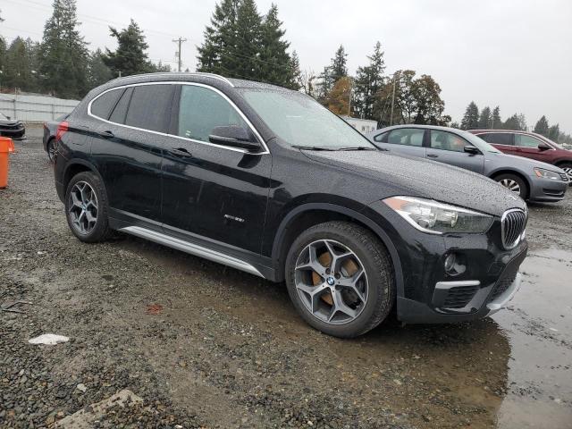 Photo 4 from auction – 2018 BMW X1 XDRIVE2 with VIN WBXHT3C31J5L26804