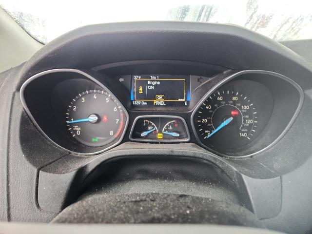 Foto 9 de la subasta – 2015 FORD FOCUS SE con VIN 1FADP3K27FL202814