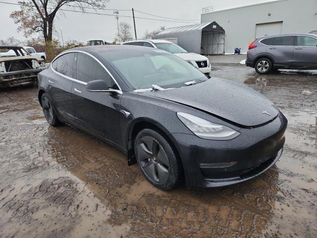 Photo 4 from auction – 2018 TESLA MODEL 3 with VIN 5YJ3E1EB9JF126939
