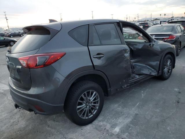 Photo 3 from auction – 2014 MAZDA CX-5 SPORT with VIN JM3KE2BE8E0343300
