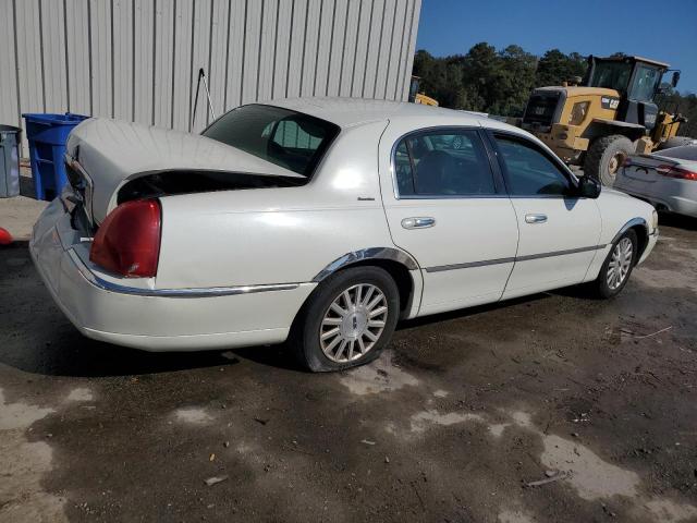Photo 3 from auction – 2003 LINCOLN TOWN CAR E with VIN 1LNHM81W73Y658246