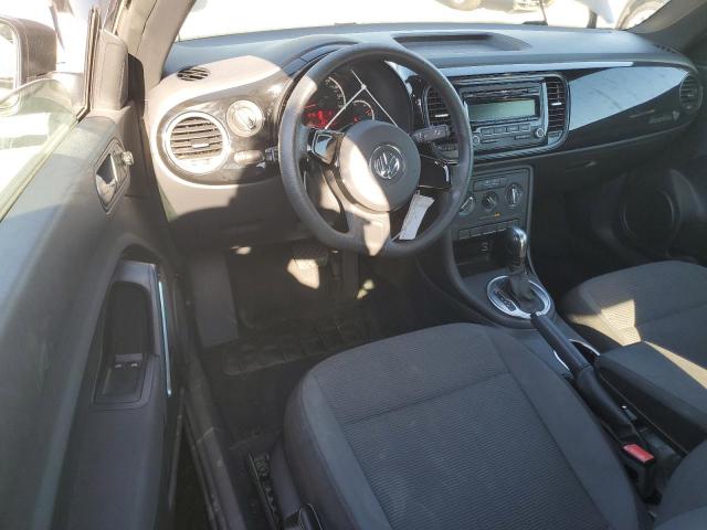 Photo 8 from auction – 2014 VOLKSWAGEN BEETLE with VIN 3VWFP7AT7EM626315
