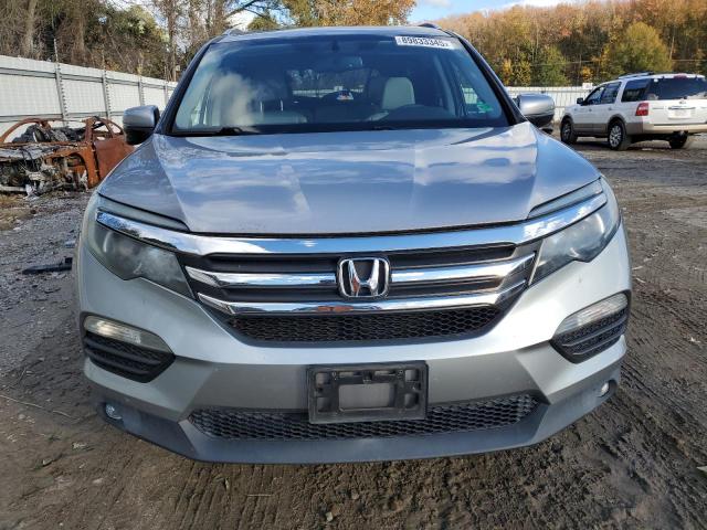 Photo 5 from auction – 2018 HONDA PILOT EXLN with VIN 5FNYF6H79JB005111