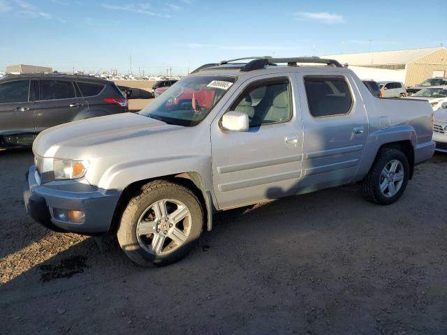 HONDA RIDGELINE 2012 with VIN 5FPYK1F51CB454406 - Photo from auction