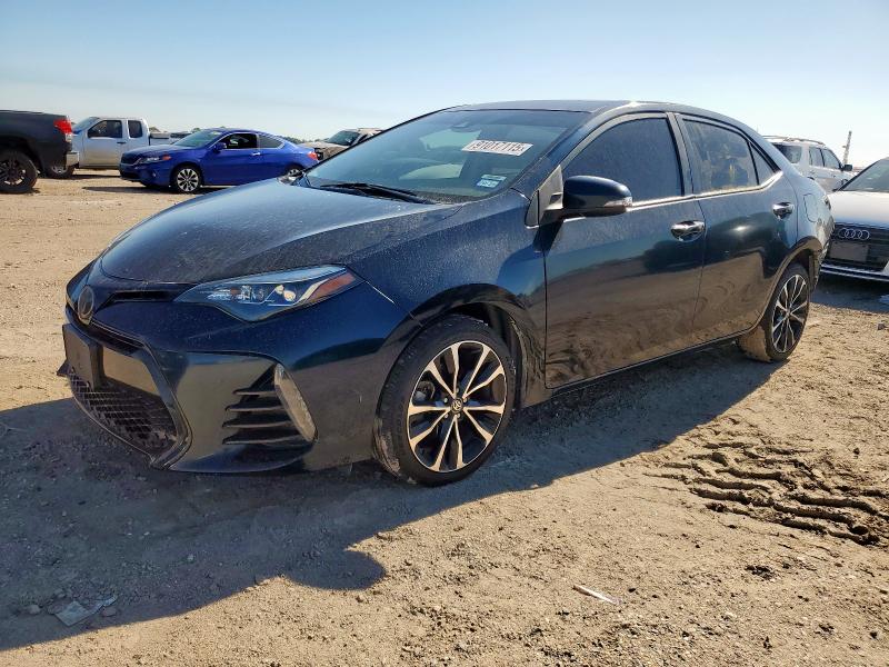 TOYOTA COROLLA L 2017 with VIN 5YFBURHE0HP682607 - Photo from auction