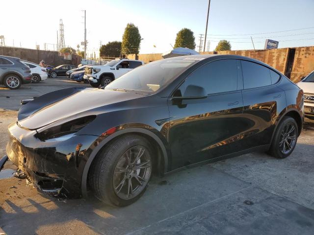 TESLA MODEL Y 2025 with VIN 7SAYGAEE2SF307962 - Photo from auction