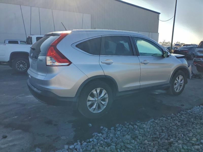 Photo 3 from auction – 2013 HONDA CR-V EX with VIN 3CZRM3H58DG702365